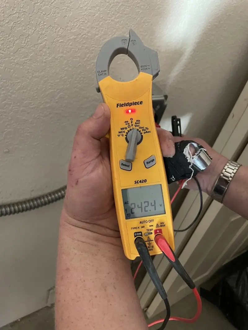 Voltage testing with clamp meter during Aluminum Wiring Replacement in Hebron